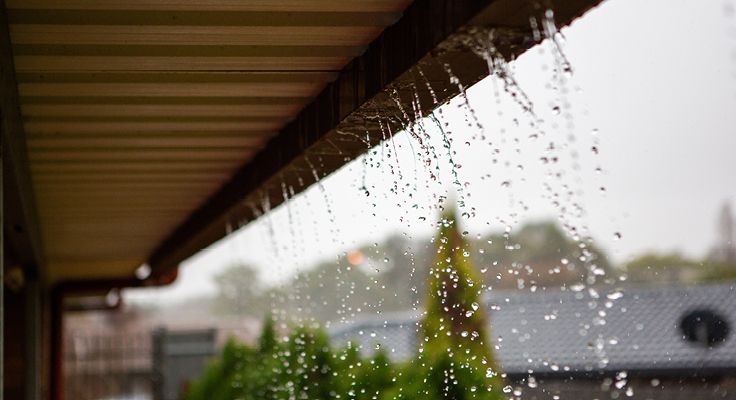 rainwater leaking from guttering